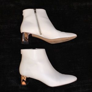 Calvin Klein white leather Mimette bootie with metallic 2” heel. Size 8